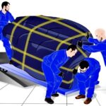 Illustrated image of movers pushing a piano up a ramp.